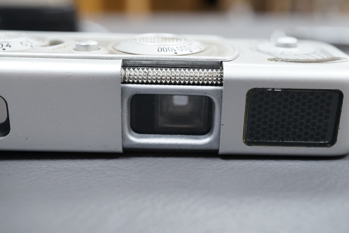 A Minolta Minox miniature camera Model B, in its original leather case with metal lanyard.